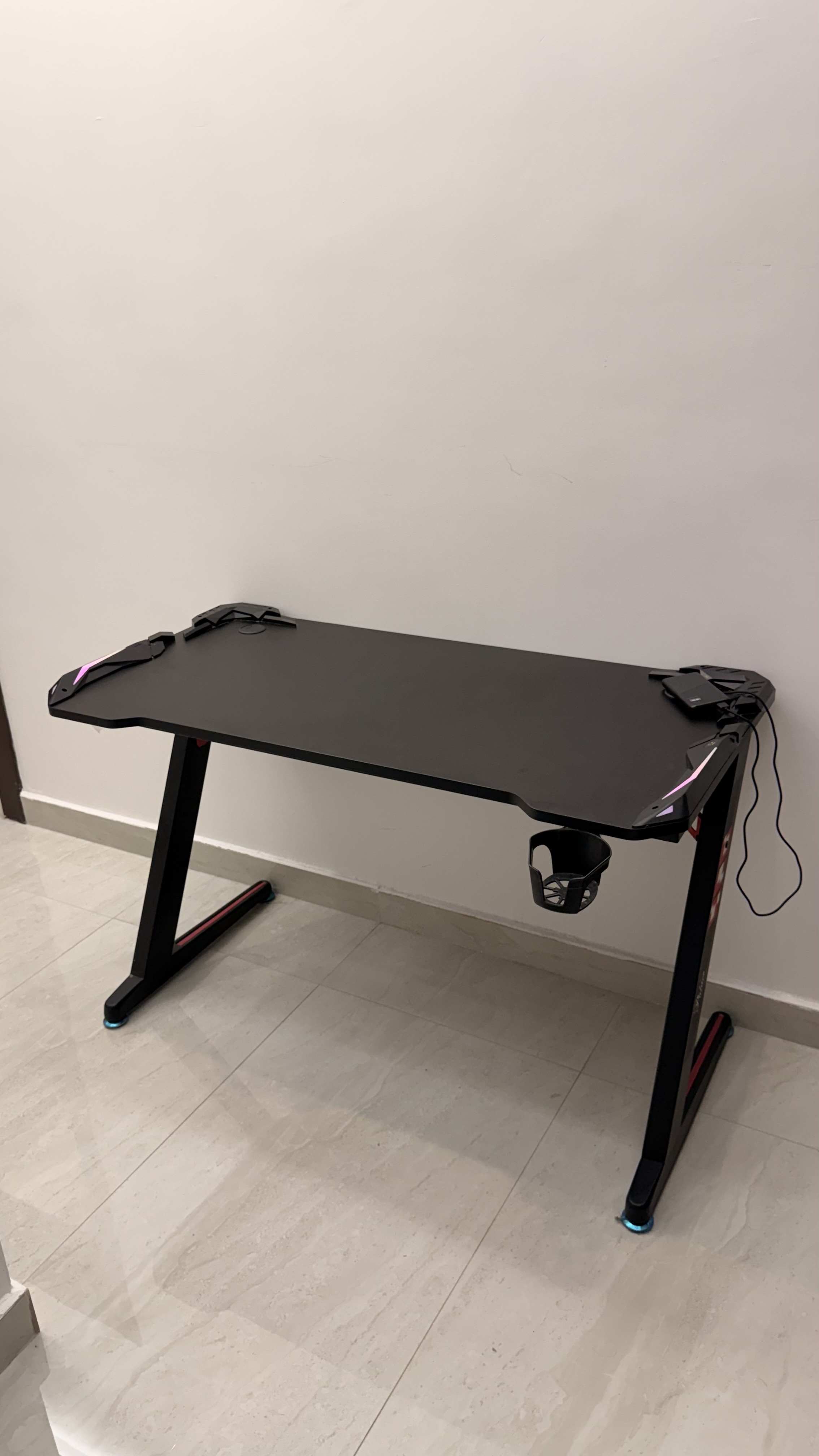 A black RGB gaming table for sale is clean and ready